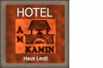 Logo von Am Kamin Hotel  und  Ferienwohnungen Duisburg-Oberhausem-Moers